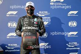 Valtteri Bottas (FIN) Mercedes AMG F1 celebrates in qualifying parc ferme with the Pirelli Pole Position Award. 31.10.2020. Formula 1 World Championship, Rd 13, Emilia Romagna Grand Prix, Imola, Italy, Qualifying Day.