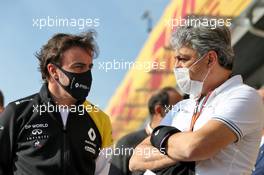 (L to R): Fernando Alonso (ESP) Renault F1 Team with Luca de Meo (ITA) Groupe Renault Chief Executive Officer. 31.10.2020. Formula 1 World Championship, Rd 13, Emilia Romagna Grand Prix, Imola, Italy, Qualifying Day.