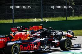 Alexander Albon (THA) Red Bull Racing RB16 passes his team mate Max Verstappen (NLD) Red Bull Racing RB16, who spun in the first practice session. 04.09.2020. Formula 1 World Championship, Rd 8, Italian Grand Prix, Monza, Italy, Practice Day.