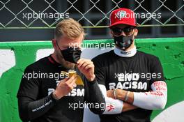 Kevin Magnussen (DEN) Haas F1 Team and Antonio Giovinazzi (ITA) Alfa Romeo Racing on the grid. 06.09.2020. Formula 1 World Championship, Rd 8, Italian Grand Prix, Monza, Italy, Race Day.