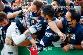Race winner Pierre Gasly (FRA) AlphaTauri celebrates with the team in parc ferme. 06.09.2020. Formula 1 World Championship, Rd 8, Italian Grand Prix, Monza, Italy, Race Day.