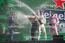 Carlos Sainz Jr (ESP) McLaren with Pierre Gasly (FRA) AlphaTauri and Lance Stroll (CDN) Racing Point F1 Team. 06.09.2020. Formula 1 World Championship, Rd 8, Italian Grand Prix, Monza, Italy, Race Day.