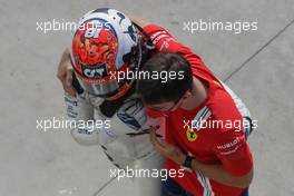 Race winner Pierre Gasly (FRA) AlphaTauri celebrates with Charles Leclerc (MON) Ferrari in parc ferme. 06.09.2020. Formula 1 World Championship, Rd 8, Italian Grand Prix, Monza, Italy, Race Day.