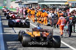 Carlos Sainz Jr (ESP) McLaren MCL35 in the pits while the race is stopped. 06.09.2020. Formula 1 World Championship, Rd 8, Italian Grand Prix, Monza, Italy, Race Day.