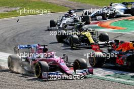 Max Verstappen (NLD) Red Bull Racing RB16 and Sergio Perez (MEX) Racing Point F1 Team RP19 battle for position. 06.09.2020. Formula 1 World Championship, Rd 8, Italian Grand Prix, Monza, Italy, Race Day.