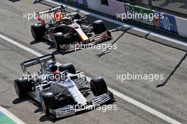 Daniil Kvyat (RUS) AlphaTauri AT01 and Max Verstappen (NLD) Red Bull Racing RB16. 05.09.2020. Formula 1 World Championship, Rd 8, Italian Grand Prix, Monza, Italy, Qualifying Day.