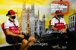 (L to R): Antonio Giovinazzi (ITA) Alfa Romeo Racing and Kimi Raikkonen (FIN) Alfa Romeo Racing in the FIA Press Conference. 03.09.2020. Formula 1 World Championship, Rd 8, Italian Grand Prix, Monza, Italy, Preparation Day.
