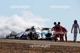 Pierre Gasly (FRA) watches marshals put out the fire in his AlphaTauri AT01 in the second practice session.  23.10.2020. Formula 1 World Championship, Rd 12, Portuguese Grand Prix, Portimao, Portugal, Practice Day.
