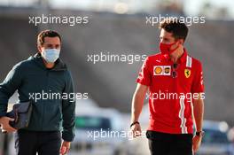 Charles Leclerc (MON) Ferrari with Nicolas Todt (FRA) Driver Manager (Left). 23.10.2020. Formula 1 World Championship, Rd 12, Portuguese Grand Prix, Portimao, Portugal, Practice Day.