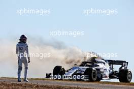 Pierre Gasly (FRA) watches his AlphaTauri AT01 on fire after stopping in the second practice session.  23.10.2020. Formula 1 World Championship, Rd 12, Portuguese Grand Prix, Portimao, Portugal, Practice Day.