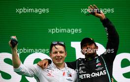 Race winner Lewis Hamilton (GBR) Mercedes AMG F1 celebrates on the podium with Peter Bonnington (GBR) Mercedes AMG F1 Race Engineer. 25.10.2020. Formula 1 World Championship, Rd 12, Portuguese Grand Prix, Portimao, Portugal, Race Day.