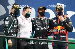 The podium (L to R): Valtteri Bottas (FIN) Mercedes AMG F1, second; Peter Bonnington (GBR) Mercedes AMG F1 Race Engineer, Lewis Hamilton (GBR) Mercedes AMG F1, race winner; Max Verstappen (NLD) Red Bull Racing, third. 25.10.2020. Formula 1 World Championship, Rd 12, Portuguese Grand Prix, Portimao, Portugal, Race Day.
