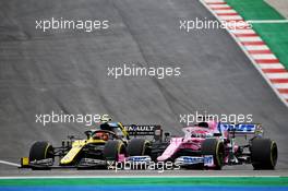 Esteban Ocon (FRA) Renault F1 Team RS20 and Sergio Perez (MEX) Racing Point F1 Team RP19 battle for position. 25.10.2020. Formula 1 World Championship, Rd 12, Portuguese Grand Prix, Portimao, Portugal, Race Day.
