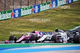 Lance Stroll (CDN) Racing Point F1 Team RP20 and Pierre Gasly (FRA) AlphaTauri AT01 battle for position. 25.10.2020. Formula 1 World Championship, Rd 12, Portuguese Grand Prix, Portimao, Portugal, Race Day.
