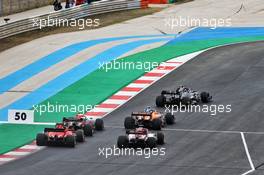Lewis Hamilton (GBR) Mercedes AMG F1 W11 leads Lando Norris (GBR) McLaren MCL35. 25.10.2020. Formula 1 World Championship, Rd 12, Portuguese Grand Prix, Portimao, Portugal, Race Day.