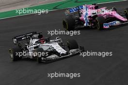 Daniil Kvyat (RUS) AlphaTauri AT01 and Sergio Perez (MEX) Racing Point F1 Team RP19 battle for position. 25.10.2020. Formula 1 World Championship, Rd 12, Portuguese Grand Prix, Portimao, Portugal, Race Day.