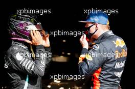 (L to R): Lewis Hamilton (GBR) Mercedes AMG F1 with Max Verstappen (NLD) Red Bull Racing in qualifying parc ferme. 24.10.2020. Formula 1 World Championship, Rd 12, Portuguese Grand Prix, Portimao, Portugal, Qualifying Day.