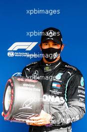 Lewis Hamilton (GBR) Mercedes AMG F1 celebrates with the Pirelli Pole Position Award. 24.10.2020. Formula 1 World Championship, Rd 12, Portuguese Grand Prix, Portimao, Portugal, Qualifying Day.