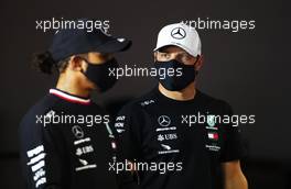 Valtteri Bottas (FIN) Mercedes AMG F1 and Lewis Hamilton (GBR) Mercedes AMG F1 in the FIA Press Conference. 22.10.2020. Formula 1 World Championship, Rd 12, Portuguese Grand Prix, Portimao, Portugal, Preparation Day.