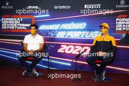 (L to R): Carlos Sainz Jr (ESP) McLaren and team mate Lando Norris (GBR) McLaren in the FIA Press Conference. 22.10.2020. Formula 1 World Championship, Rd 12, Portuguese Grand Prix, Portimao, Portugal, Preparation Day.