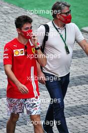 (L to R): Charles Leclerc (MON) Ferrari with his manager Morgan Caron (FRA) All Road Management. 25.09.2020. Formula 1 World Championship, Rd 10, Russian Grand Prix, Sochi Autodrom, Sochi, Russia, Practice Day.