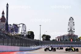 Romain Grosjean (FRA) Haas F1 Team VF-20 and Daniel Ricciardo (AUS) Renault F1 Team RS20. 25.09.2020. Formula 1 World Championship, Rd 10, Russian Grand Prix, Sochi Autodrom, Sochi, Russia, Practice Day.