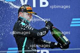Race winner Valtteri Bottas (FIN) Mercedes AMG F1 celebrates with the champagne on the podium. 27.09.2020. Formula 1 World Championship, Rd 10, Russian Grand Prix, Sochi Autodrom, Sochi, Russia, Race Day.