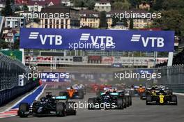 Lewis Hamilton (GBR) Mercedes AMG F1 W11 leads at the start of the race. 27.09.2020. Formula 1 World Championship, Rd 10, Russian Grand Prix, Sochi Autodrom, Sochi, Russia, Race Day.