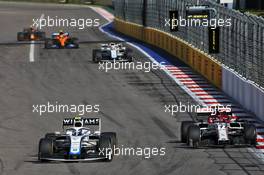 Nicholas Latifi (CDN) Williams Racing FW43 and Kimi Raikkonen (FIN) Alfa Romeo Racing C39. 27.09.2020. Formula 1 World Championship, Rd 10, Russian Grand Prix, Sochi Autodrom, Sochi, Russia, Race Day.