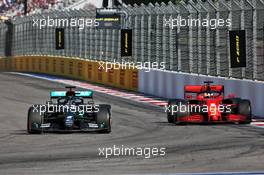 Lewis Hamilton (GBR) Mercedes AMG F1 W11 and Sebastian Vettel (GER) Ferrari SF1000. 27.09.2020. Formula 1 World Championship, Rd 10, Russian Grand Prix, Sochi Autodrom, Sochi, Russia, Race Day.
