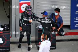 (L to R): Lewis Hamilton (GBR) Mercedes AMG F1 celebrates his pole position in qualifying parc ferme with third placed team mate Valtteri Bottas (FIN) Mercedes AMG F1. 26.09.2020. Formula 1 World Championship, Rd 10, Russian Grand Prix, Sochi Autodrom, Sochi, Russia, Qualifying Day.