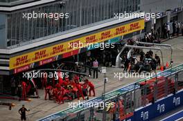 Sebastian Vettel (GER) Ferrari SF1000 and Valtteri Bottas (FIN) Mercedes AMG F1 W11 in the pits. 26.09.2020. Formula 1 World Championship, Rd 10, Russian Grand Prix, Sochi Autodrom, Sochi, Russia, Qualifying Day.