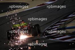 Max Verstappen (NLD) Red Bull Racing RB16 sends sparks flying. 04.12.2020. Formula 1 World Championship, Rd 16, Sakhir Grand Prix, Sakhir, Bahrain, Practice Day