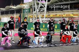 Drivers as the grid observes the national anthem. 06.12.2020. Formula 1 World Championship, Rd 16, Sakhir Grand Prix, Sakhir, Bahrain, Race Day.