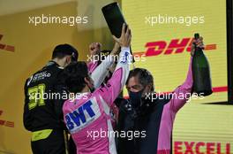 Andy Stevenson (GBR) Racing Point F1 Team Manager celebrates on the podium with race winner Sergio Perez (MEX) Racing Point F1 Team. 06.12.2020. Formula 1 World Championship, Rd 16, Sakhir Grand Prix, Sakhir, Bahrain, Race Day.