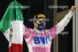 Race winner Sergio Perez (MEX) Racing Point F1 Team celebrates on the podium. 06.12.2020. Formula 1 World Championship, Rd 16, Sakhir Grand Prix, Sakhir, Bahrain, Race Day.