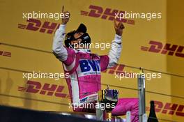 Race winner Sergio Perez (MEX) Racing Point F1 Team celebrates on the podium. 06.12.2020. Formula 1 World Championship, Rd 16, Sakhir Grand Prix, Sakhir, Bahrain, Race Day.