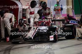 Kimi Raikkonen (FIN) Alfa Romeo Racing C39 makes a pit stop. 06.12.2020. Formula 1 World Championship, Rd 16, Sakhir Grand Prix, Sakhir, Bahrain, Race Day.
