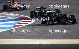 George Russell (GBR) Mercedes AMG F1 W11 leads team mate Valtteri Bottas (FIN) Mercedes AMG F1 W11. 06.12.2020. Formula 1 World Championship, Rd 16, Sakhir Grand Prix, Sakhir, Bahrain, Race Day.