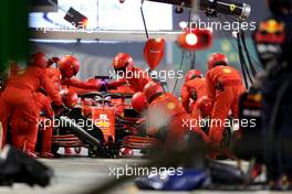 Sebastian Vettel (GER) Ferrari SF1000 makes a pit stop. 06.12.2020. Formula 1 World Championship, Rd 16, Sakhir Grand Prix, Sakhir, Bahrain, Race Day.