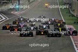 (L to R): George Russell (GBR) Mercedes AMG F1 W11, Max Verstappen (NLD) Red Bull Racing RB16, Valtteri Bottas (FIN) Mercedes AMG F1 W11, and Sergio Perez (MEX) Racing Point F1 Team RP19 at the start of the race. 06.12.2020. Formula 1 World Championship, Rd 16, Sakhir Grand Prix, Sakhir, Bahrain, Race Day.
