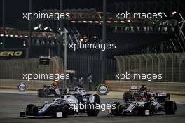 Nicholas Latifi (CDN) Williams Racing FW43 and Antonio Giovinazzi (ITA) Alfa Romeo Racing C39. 06.12.2020. Formula 1 World Championship, Rd 16, Sakhir Grand Prix, Sakhir, Bahrain, Race Day.
