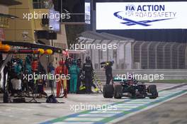 George Russell (GBR) Mercedes AMG F1 W11 makes a pit stop. 06.12.2020. Formula 1 World Championship, Rd 16, Sakhir Grand Prix, Sakhir, Bahrain, Race Day.