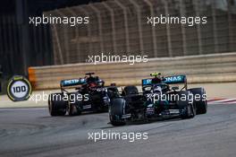 Valtteri Bottas (FIN) Mercedes AMG F1 W11 leads team mate George Russell (GBR) Mercedes AMG F1 W11.  06.12.2020. Formula 1 World Championship, Rd 16, Sakhir Grand Prix, Sakhir, Bahrain, Race Day.