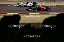Alexander Albon (THA) Red Bull Racing RB16 and Daniil Kvyat (RUS) AlphaTauri AT01. 05.12.2020. Formula 1 World Championship, Rd 16, Sakhir Grand Prix, Sakhir, Bahrain, Qualifying Day.