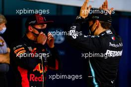 (L to R): Max Verstappen (NLD) Red Bull Racing with George Russell (GBR) Mercedes AMG F1 in qualifying parc ferme. 05.12.2020. Formula 1 World Championship, Rd 16, Sakhir Grand Prix, Sakhir, Bahrain, Qualifying Day.