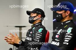 (L to R): George Russell (GBR) Mercedes AMG F1 with team mate Valtteri Bottas (FIN) Mercedes AMG F1 in the post qualifying FIA Press Conference. 05.12.2020. Formula 1 World Championship, Rd 16, Sakhir Grand Prix, Sakhir, Bahrain, Qualifying Day.
