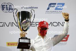 Mick Schumacher (GER) celebrates winning the F2 Championship. 06.12.2020. Formula 1 World Championship, Rd 16, Sakhir Grand Prix, Sakhir, Bahrain, Race Day.