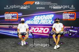 (L to R): Valtteri Bottas (FIN) Mercedes AMG F1 and team mate George Russell (GBR) Mercedes AMG F1 in the FIA Press Conference. 03.12.2020. Formula 1 World Championship, Rd 16, Sakhir Grand Prix, Sakhir, Bahrain, Preparation Day.