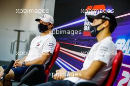 (L to R): Valtteri Bottas (FIN) Mercedes AMG F1 and team mate George Russell (GBR) Mercedes AMG F1 in the FIA Press Conference. 03.12.2020. Formula 1 World Championship, Rd 16, Sakhir Grand Prix, Sakhir, Bahrain, Preparation Day.